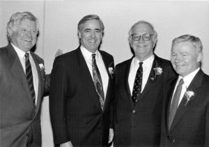 Senator Edward M. Kennedy, unidentified man, John Joseph Moakley, and William Bulger at an event