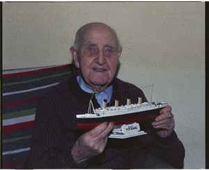 Samuel McLaughlin, riveter on the Titanic, with model of Titanic