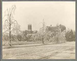 Gasson Hall and Saint Mary's Hall from snowy path around reservoir, by Clifton Church