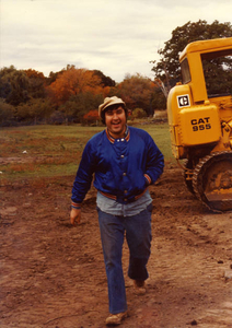 Saul Weiss working at Weiss Farm