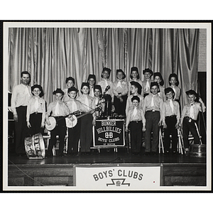 The Bunker Hillbillies pose for a group photo on a stage