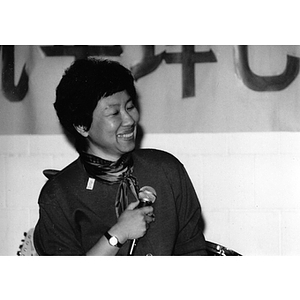 Woman speaks at dinner held at the Josiah Quincy School celebrating Chinatown's victory to build a community center on Parcel C