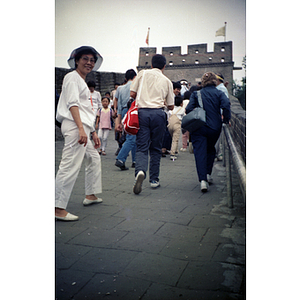 Suzanne Lee walks among other tourists on the Great Wall of China