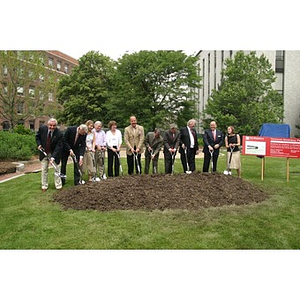 People prepare to break ground at the Veterans Memorial