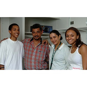 Melanie Arvajo poses with three others during move-in