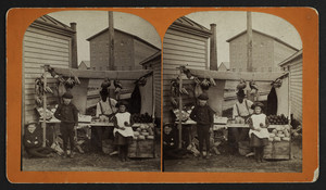 Stereograph of a street vendor and three children at a produce stand, Leominster, Mass., 1888