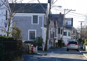 View down Commercial Street (West End Racing Club in the foreground), Provincetown