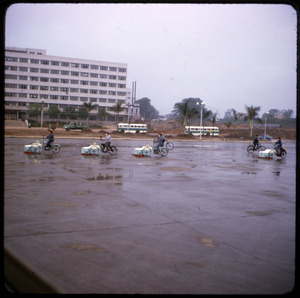 Women cleaning the plaza