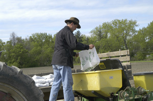 Lazy Acres Farm (Zuchowski Farm): Allan Zuchowski loading fertilizer for his corn crop