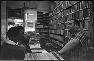 John Belmonte with customer in his record store, Big John's Oldies but Goodies Land