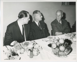 Three men at Thanksgiving celebration