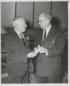 Jeremiah Milbank awarding man