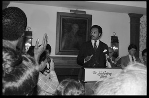 Jesse Jackson at the podium, addressing supporters