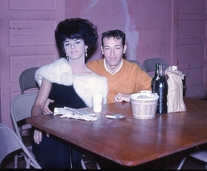 Drag Queen and Man Sitting at a Table (December 1964)