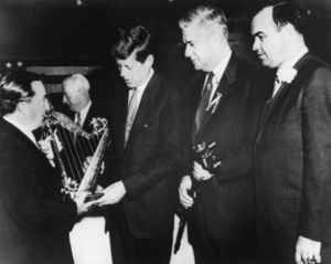John E. Powers presenting aharp to John F. Kennedy with John Joseph Moakley and Tip O'Neill, 1960s