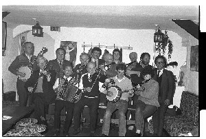 McElroy family, group of 14 traditional musicians. Pictured playing in the pub