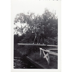 Two boys pose on diving board at Breezy Meadows Camp