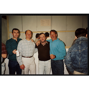 Four Bunker Hillbilly alumni pose for a candid shot at a reunion event