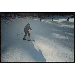 A child skis on a slope