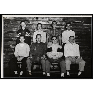 Group of eight teenage boys pose for a photo in the South Boston Clubhouse