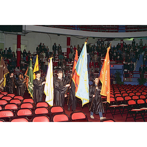 Northeastern flag bearers enter Matthews Arena for the inauguration of President Freeland