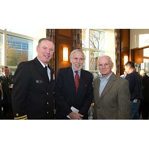 Vice Admiral Mark Fitzgerald poses with two other men at the Veterans Memorial dedication ceremony