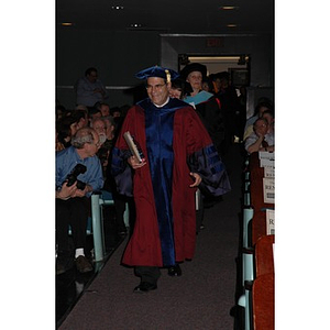 Faculty members proceed into School of Nursing convocation