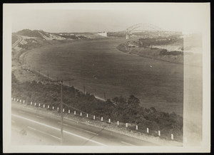 A view of the Cape Cod Canal with the Sagamore Bridge in the background