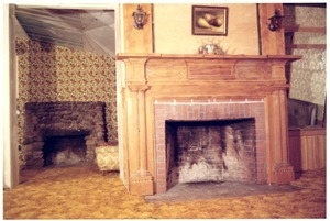 Fireplaces in a living room of the Brotherhood of the Spirit house on Main Street