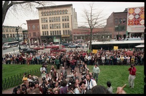 Defendants filing down the steps of the Hampshire County courthouse following their acquittal in the CIA protest trial, with crowd of supporters on the sidewalk
