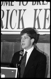 Patrick Kennedy campaign breakfast of ham and eggs at Caruso's Restaurant: close-up of Kennedy speaking at the podium beneath a sign reading 'Welcome to breakfast with Patrick Kennedy'