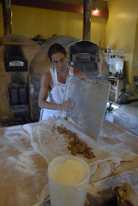 Hungry Ghost Bread: owner and baker Jonathan C. Stevens working on cinnamon rolls