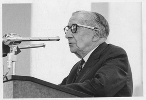 Frank L. Boyden standing at a podium