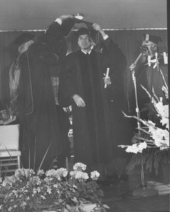 Glenn Seaborg at his hooding ceremony during the Centennial Charter Day convocation