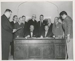 Presidents Bruce Barton of ICD and Carroll V. Newsom of NYU signing an affiliation agreement