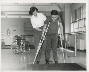 Luis Damilano with physical therapist