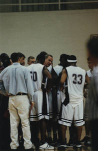 Springfield College Men's Basketball team in a huddle (2000)