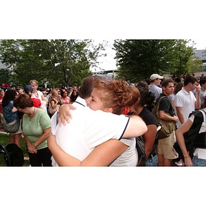 Nadia Alvarez and President Aoun hug at the President's barbecue