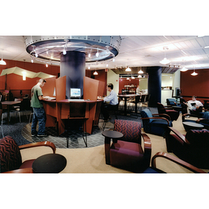 Students work at computer workstations in the Cyber Cafe in Snell Library
