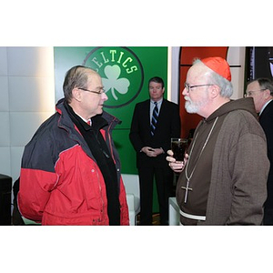 President Aoun and Cardinal O'Malley talking at a Beanpot Reception