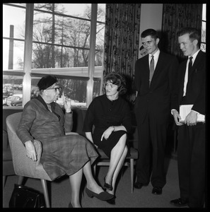 Eleanor Roosevelt (left) seated in the Cape Cod Lounge (Student Union), in conversation with Gail Osbaldeston ('61, seated) and Donald Croteau ('61), during Roosevelt's Distinguished Visitors Program appearance at UMass Amherst