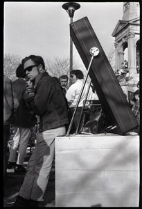 Crowd on Cambridge Common: young man in sunglasses