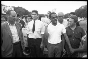 David Dellinger, Staughton Lynd, and Robert Parris Moses (left to right) at front of march: Assembly of Unrepresented People peace march on Washington