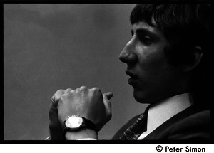 Pete Townshend: close-up, with hands clasped