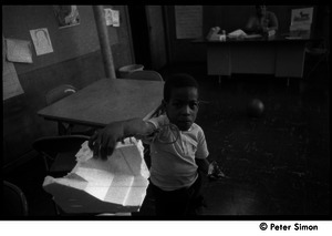 African American boy in the Liberation School classroom
