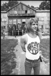 Michael Metelica standing in front of the Warwick dormitory, Brotherhood of the Spirit commune