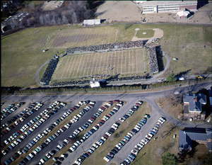 Aerial view of football field and parking lot
