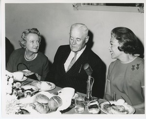 Mrs. Jeremiah Milbank, Hermann G. Place, and Mrs. William S. Kilbourne at Thanksgiving celebration