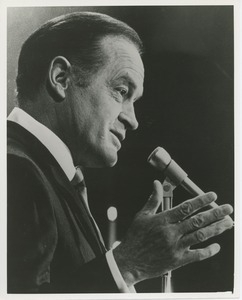 Bob Hope speaking at microphone