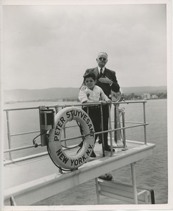 Admiral William F. Halsey and Ralph Luciano stand on bridge